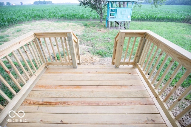 7950 N 475 E, Columbus, IN 47203 - wooden terrace featuring agricultural area, a view of countryside, and a yard