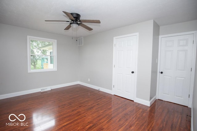 7950 N 475 E, Columbus, IN 47203 - unfurnished bedroom with wood finished floors and ceiling fan