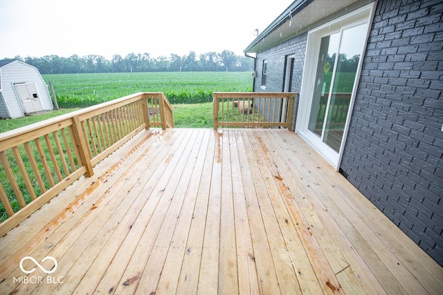 7950 N 475 E, Columbus, IN 47203 - deck featuring agricultural plots, a rural view, and a storage unit