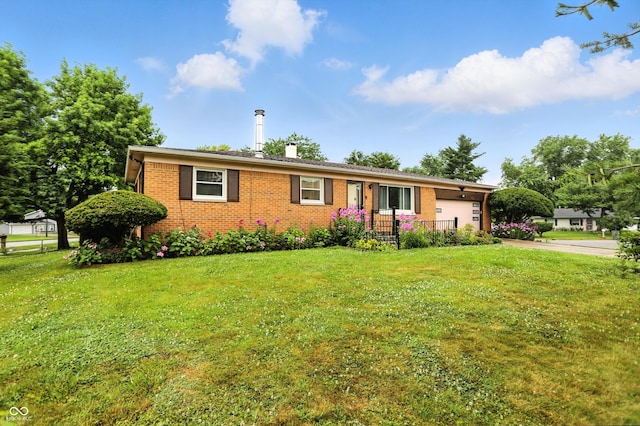 5560 Royal Oak Ct, Indianapolis, IN 46227 - ranch-style home featuring driveway, a front lawn, brick siding, a garage, and a chimney