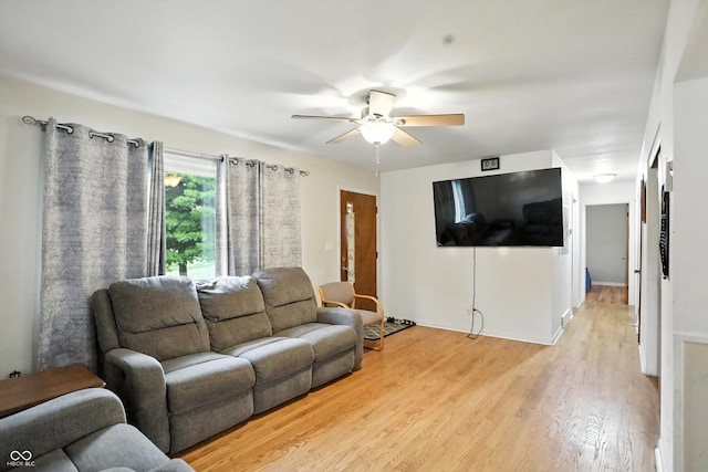 5560 Royal Oak Ct, Indianapolis, IN 46227 - living room featuring a ceiling fan and light wood finished floors