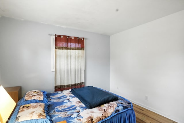 5560 Royal Oak Ct, Indianapolis, IN 46227 - bedroom featuring wood finished floors and baseboards