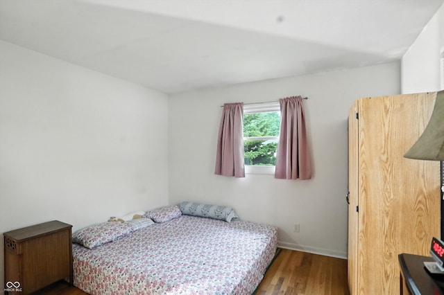 5560 Royal Oak Ct, Indianapolis, IN 46227 - bedroom featuring wood finished floors and baseboards