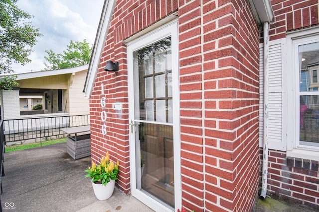 1606 California St, Columbus, IN 47201 - entrance to property featuring brick siding and a porch