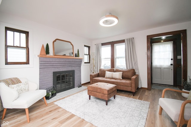 1606 California St, Columbus, IN 47201 - living area featuring light wood-style flooring and a fireplace