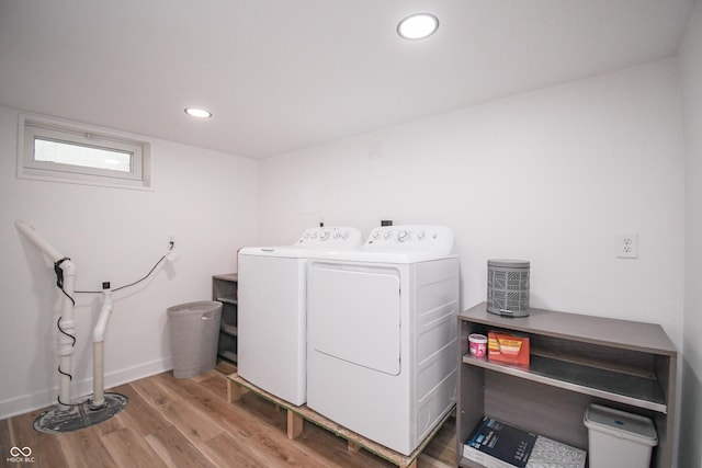 1606 California St, Columbus, IN 47201 - laundry area with washer and dryer, wood finished floors, and recessed lighting