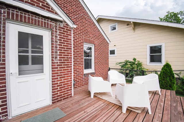 1606 California St, Columbus, IN 47201 - wooden deck featuring outdoor dining space