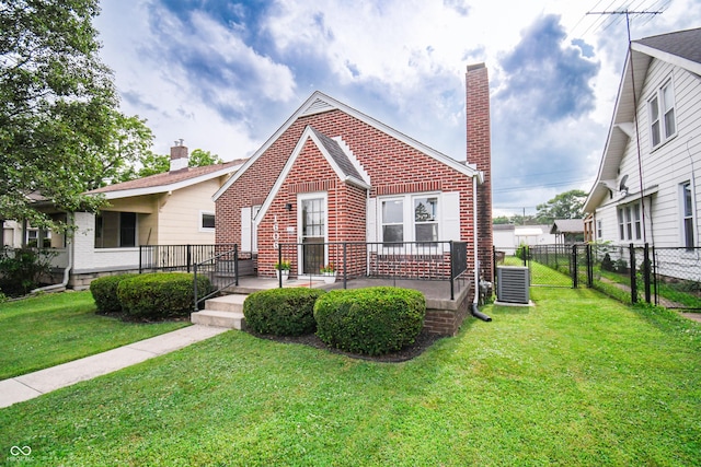 1606 California St, Columbus, IN 47201 - english style home with brick siding and a chimney