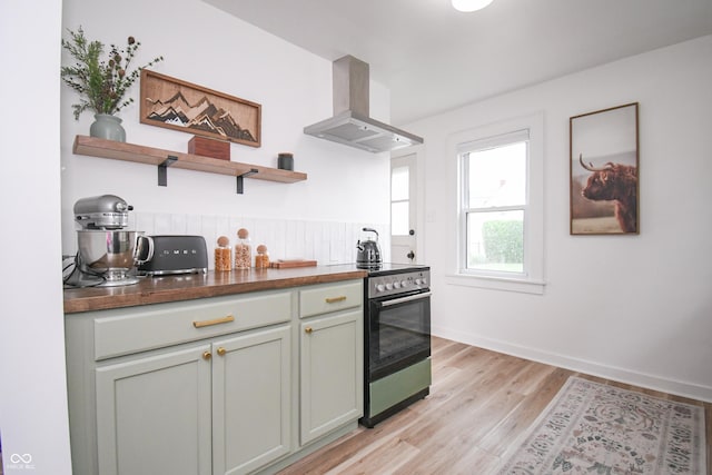 1606 California St, Columbus, IN 47201 - kitchen featuring range hood, stainless steel electric range oven, open shelves, and light wood-type flooring