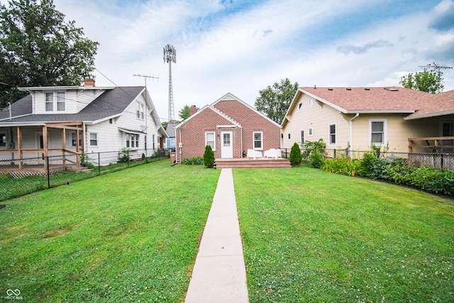 1606 California St, Columbus, IN 47201 - back of house with a fenced backyard and a wooden deck