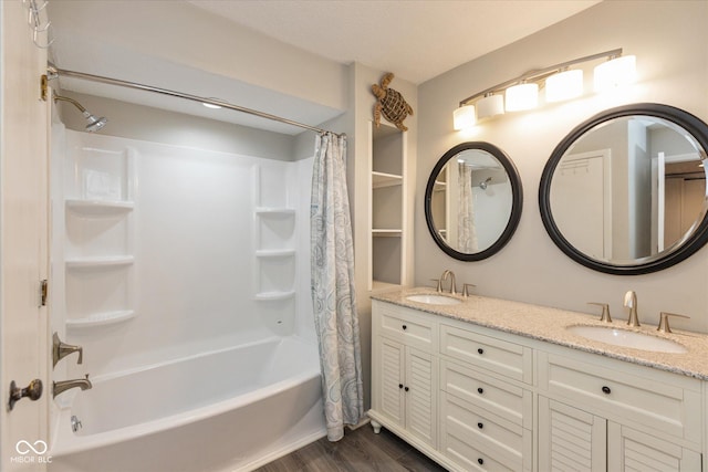 5038 Hawthorne Way, Avon, IN 46123 - full bath with shower / bath combo, wood finished floors, and double vanity