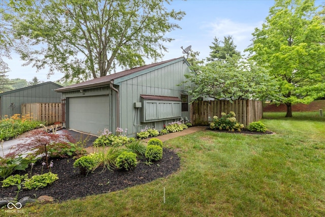 5038 Hawthorne Way, Avon, IN 46123 - view of yard featuring a garage