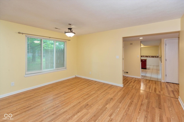 5038 Hawthorne Way, Avon, IN 46123 - spare room with light wood finished floors and baseboards