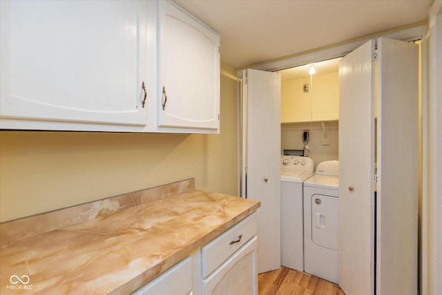 5038 Hawthorne Way, Avon, IN 46123 - washroom featuring washing machine and dryer and light wood-type flooring
