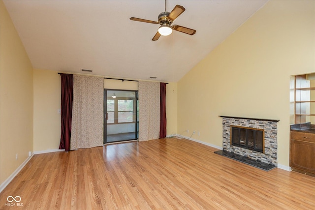 5038 Hawthorne Way, Avon, IN 46123 - unfurnished living room with light wood-type flooring, ceiling fan, a fireplace, and vaulted ceiling