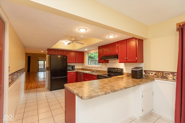 5038 Hawthorne Way, Avon, IN 46123 - kitchen featuring black appliances, under cabinet range hood, a peninsula, light tile patterned floors, and a ceiling fan