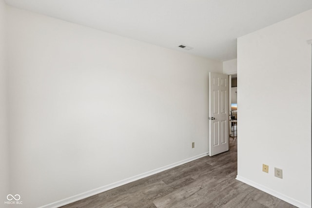 7930 Cork Bend Ln, Indianapolis, IN 46239 - spare room with wood finished floors and baseboards