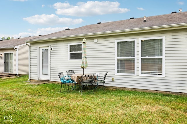 7930 Cork Bend Ln, Indianapolis, IN 46239 - rear view of property featuring a yard