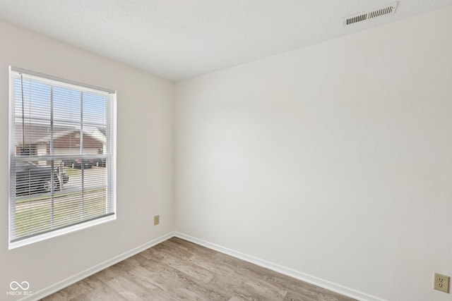 7930 Cork Bend Ln, Indianapolis, IN 46239 - unfurnished room featuring light wood-style floors and baseboards