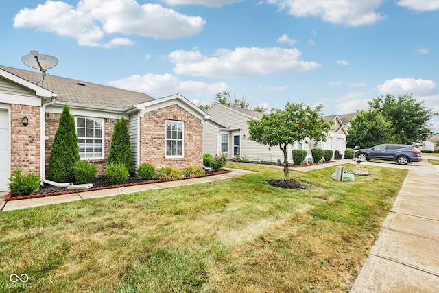 7930 Cork Bend Ln, Indianapolis, IN 46239 - single story home with brick siding, a front yard, and roof with shingles