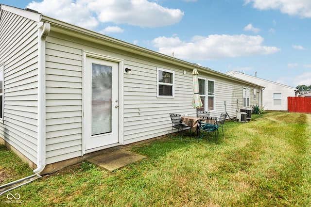 7930 Cork Bend Ln, Indianapolis, IN 46239 - rear view of house featuring a yard