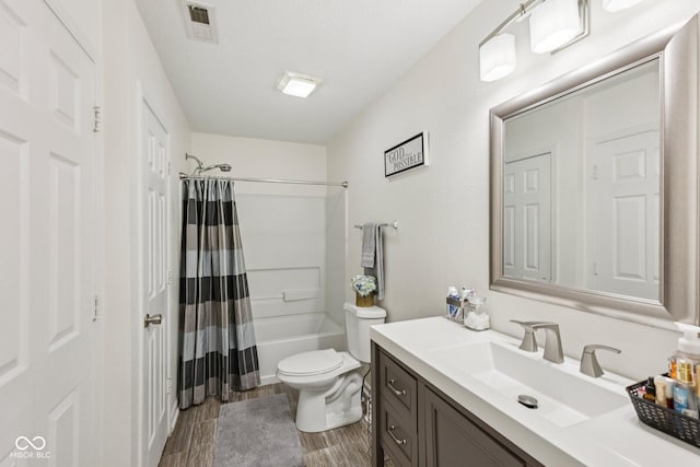 7930 Cork Bend Ln, Indianapolis, IN 46239 - bathroom featuring vanity, shower / bath combo with shower curtain, and wood finished floors