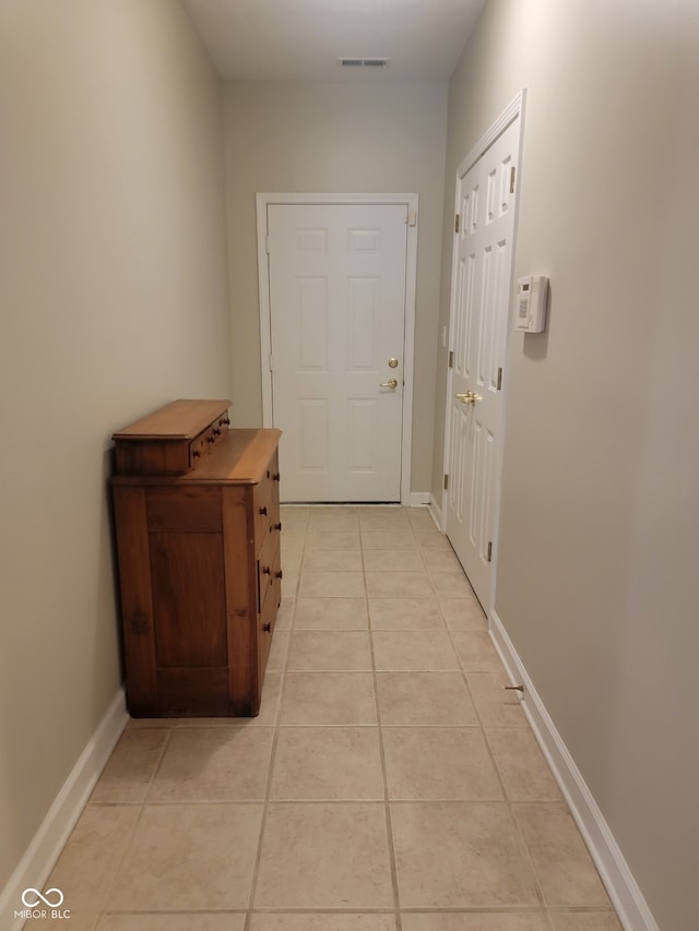 1096 Shadow Ridge Rd, Carmel, IN 46280 - hallway with light tile patterned floors and baseboards