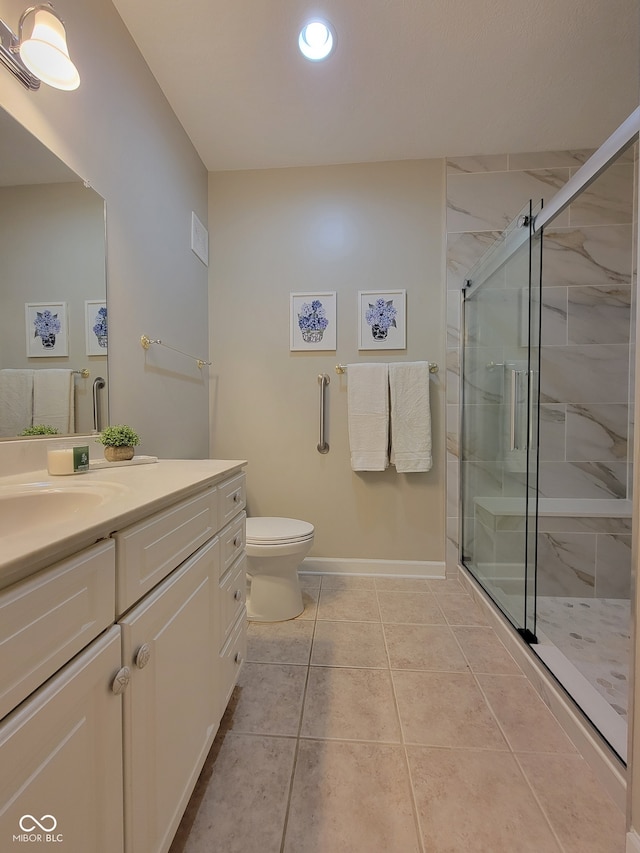 1096 Shadow Ridge Rd, Carmel, IN 46280 - bathroom featuring vanity, a stall shower, tile patterned floors, and recessed lighting