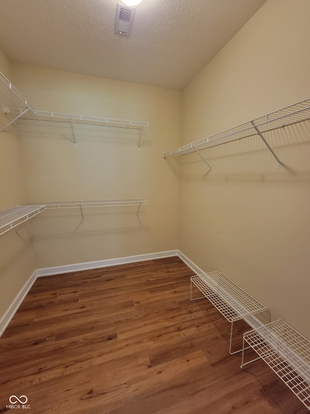 1096 Shadow Ridge Rd, Carmel, IN 46280 - spacious closet with wood finished floors