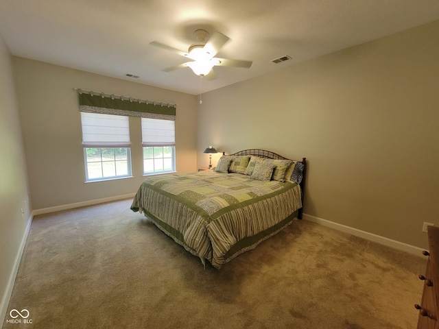 1096 Shadow Ridge Rd, Carmel, IN 46280 - carpeted bedroom with baseboards and a ceiling fan
