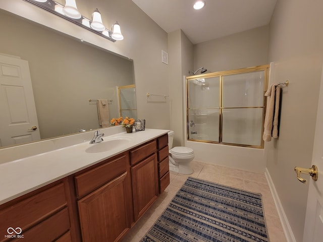1096 Shadow Ridge Rd, Carmel, IN 46280 - bathroom featuring vanity, tile patterned flooring, bath / shower combo with glass door, and recessed lighting