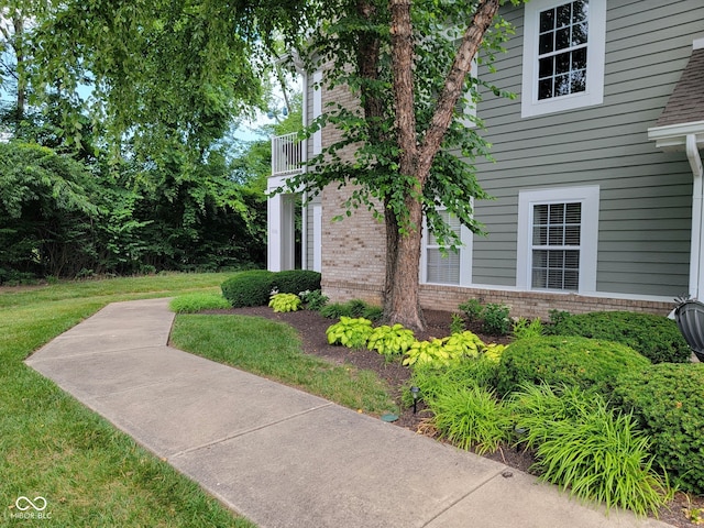 1096 Shadow Ridge Rd, Carmel, IN 46280 - view of side of property featuring brick siding and a lawn