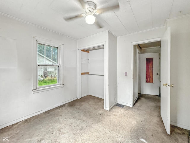 1518 S Goodlet Ave, Indianapolis, IN 46241 - unfurnished bedroom with a closet, ornamental molding, ceiling fan, and carpet