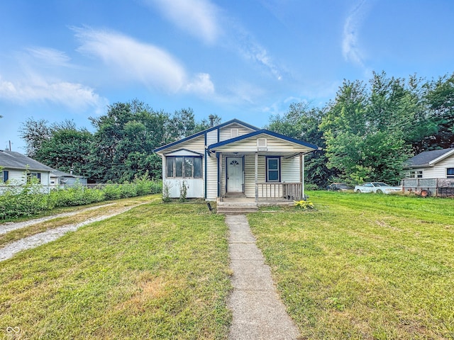 1518 S Goodlet Ave, Indianapolis, IN 46241 - bungalow-style house with a porch and a front yard
