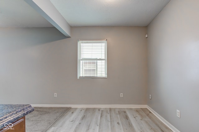 3426 N Olney St, Indianapolis, IN 46218 - empty room with light wood finished floors and baseboards