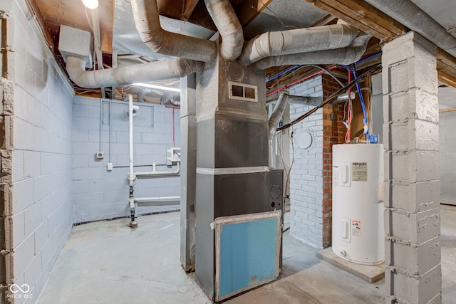 3426 N Olney St, Indianapolis, IN 46218 - unfinished basement with electric water heater and heating unit