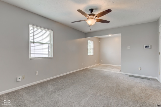 3426 N Olney St, Indianapolis, IN 46218 - unfurnished room featuring ceiling fan and light colored carpet