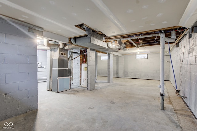 3426 N Olney St, Indianapolis, IN 46218 - below grade area with heating unit and electric water heater