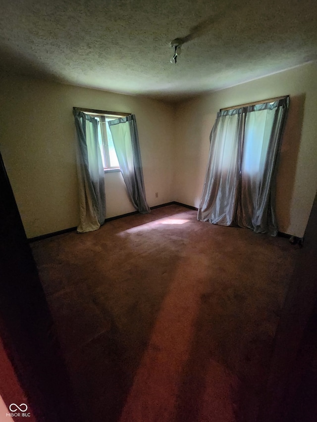 4365 Liberty Loop Rd, Martinsville, IN 46151 - empty room featuring carpet floors and a textured ceiling