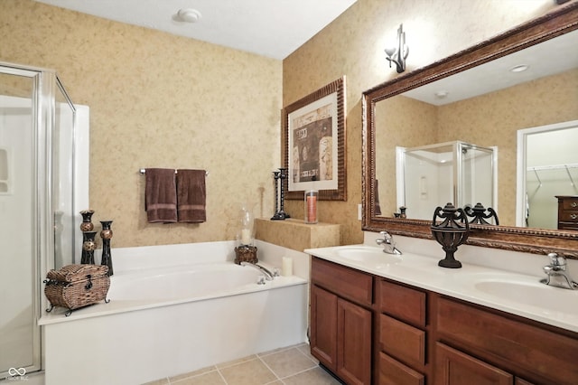 13534 E 131st St, Fishers, IN 46037 - bathroom with a stall shower, wallpapered walls, a bath, double vanity, and tile patterned floors