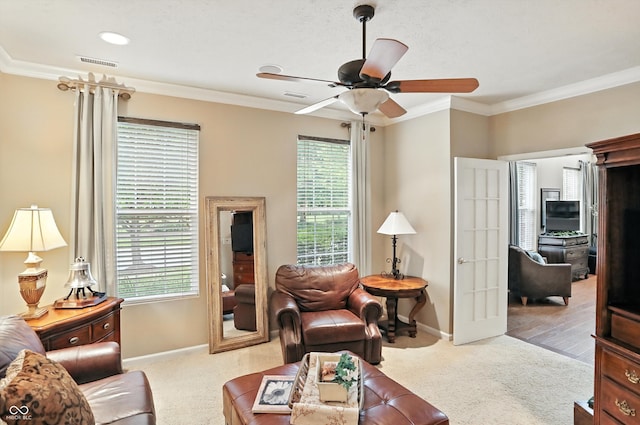 13534 E 131st St, Fishers, IN 46037 - carpeted living room featuring ceiling fan and crown molding