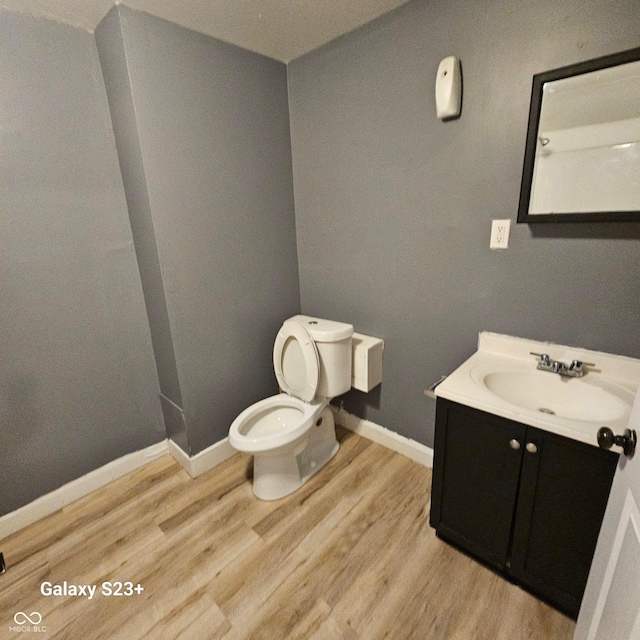 1206 W 25th St, Indianapolis, IN 46208 - bathroom with vanity and wood finished floors