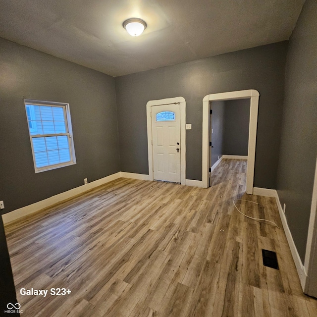 1206 W 25th St, Indianapolis, IN 46208 - entryway with wood finished floors and baseboards