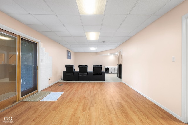 3905 Cove Rd, Columbus, IN 47203 - living area with wood finished floors and a drop ceiling