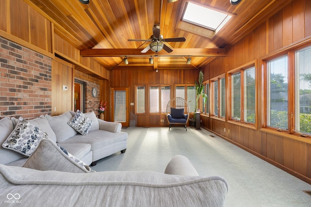 3905 Cove Rd, Columbus, IN 47203 - sunroom / solarium with wooden ceiling, plenty of natural light, wooden walls, a skylight, and carpet