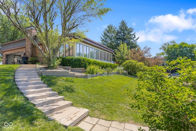 3905 Cove Rd, Columbus, IN 47203 - view of grassy yard with a sunroom