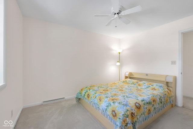 3905 Cove Rd, Columbus, IN 47203 - bedroom featuring carpet, a baseboard radiator, and ceiling fan