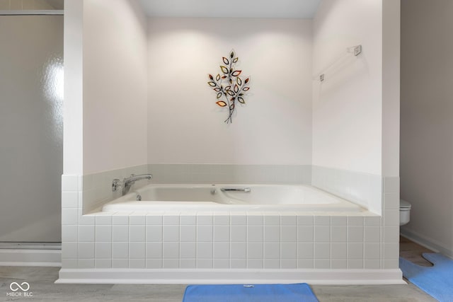 3905 Cove Rd, Columbus, IN 47203 - bathroom featuring a bath, wood finished floors, and an enclosed shower