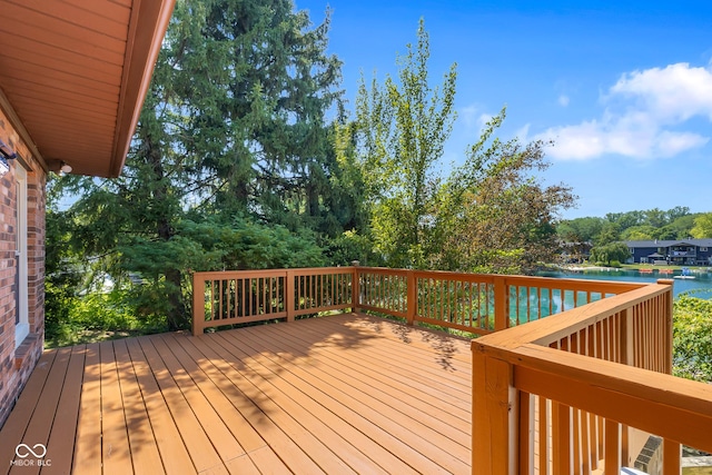 3905 Cove Rd, Columbus, IN 47203 - wooden deck featuring a water view