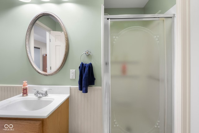 3905 Cove Rd, Columbus, IN 47203 - full bathroom featuring a wainscoted wall, a stall shower, and vanity